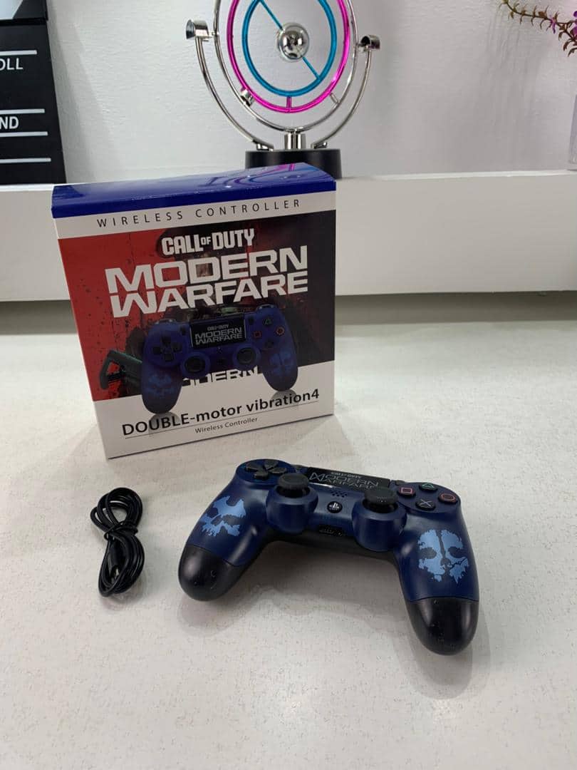SONY DualShock Manette PS4 Sans Fil, Batterie Rechargeable (High Copy) – Edition Moderne Warfare - Jouet & Gaming - صورة 6