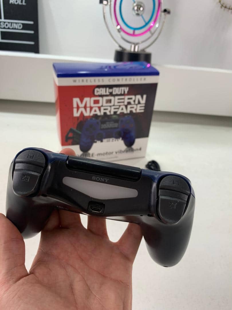 SONY DualShock Manette PS4 Sans Fil, Batterie Rechargeable (High Copy) – Edition Moderne Warfare - Jouet & Gaming - صورة 8
