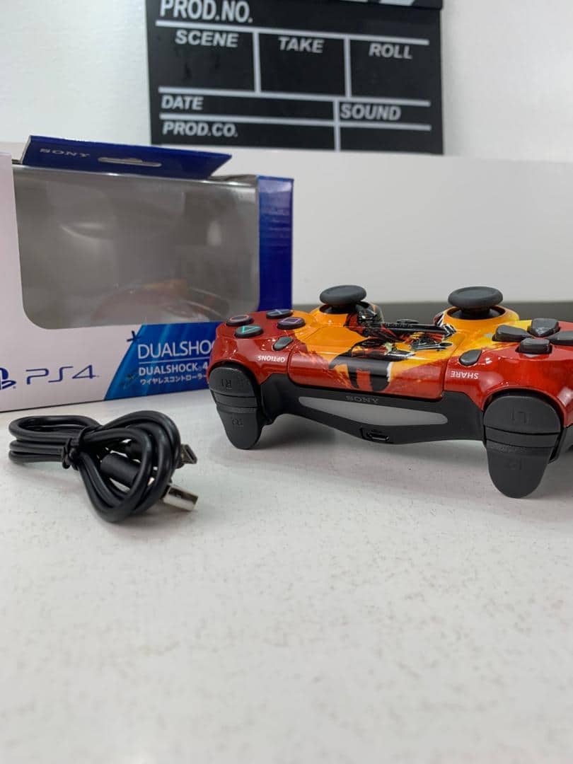 SONY DualShock Manette PS4 Sans Fil, Batterie Rechargeable (High Copy) – Edition Read Dead Redemption 2 - Jouet & Gaming - صورة 6