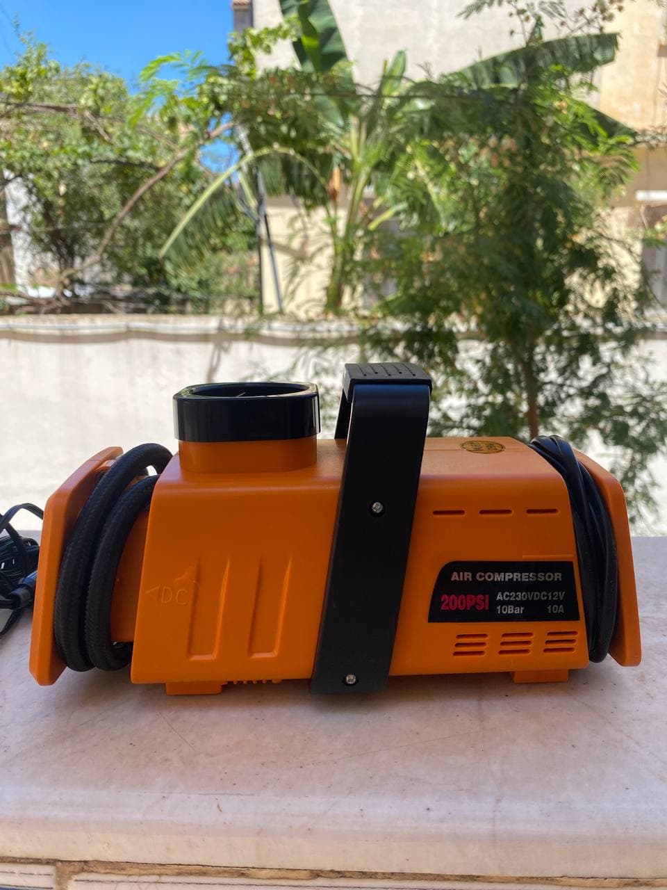 Compresseur d’aire a double adaptateur 220v/12v- 200psi - Orange - Électronique - صورة حقيقية 9