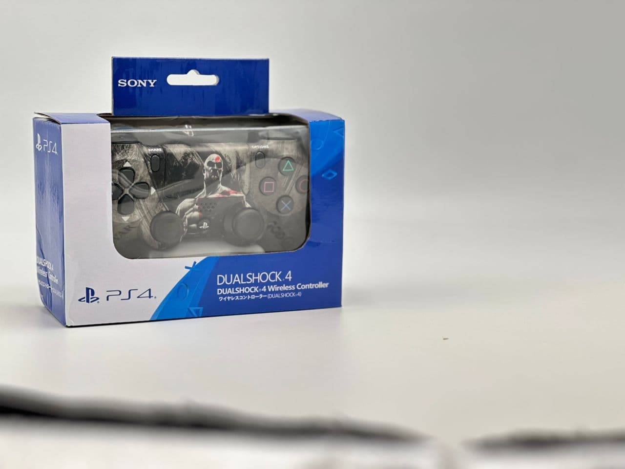 SONY DualShock Manette PS4 Sans Fil, Batterie Rechargeable (High Copy) – Edition God of War - Jouet & Gaming - صورة حقيقية 6