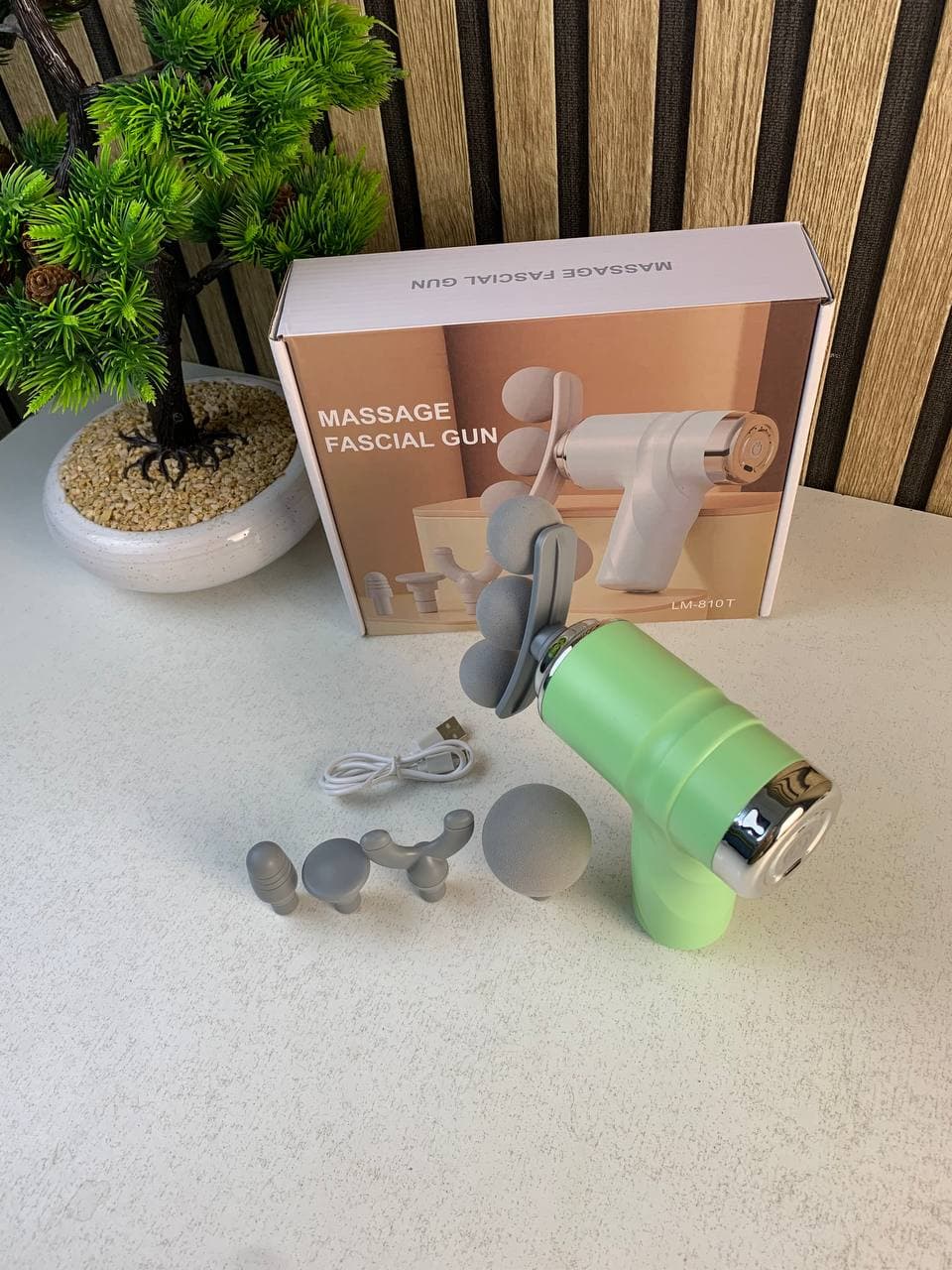 Pistolet de massage pour soulager la douleur 6 vitesses 4 têtes LM-810T - جهاز تدليك بعدة رِؤوس - Électronique - صورة حقيقية 11